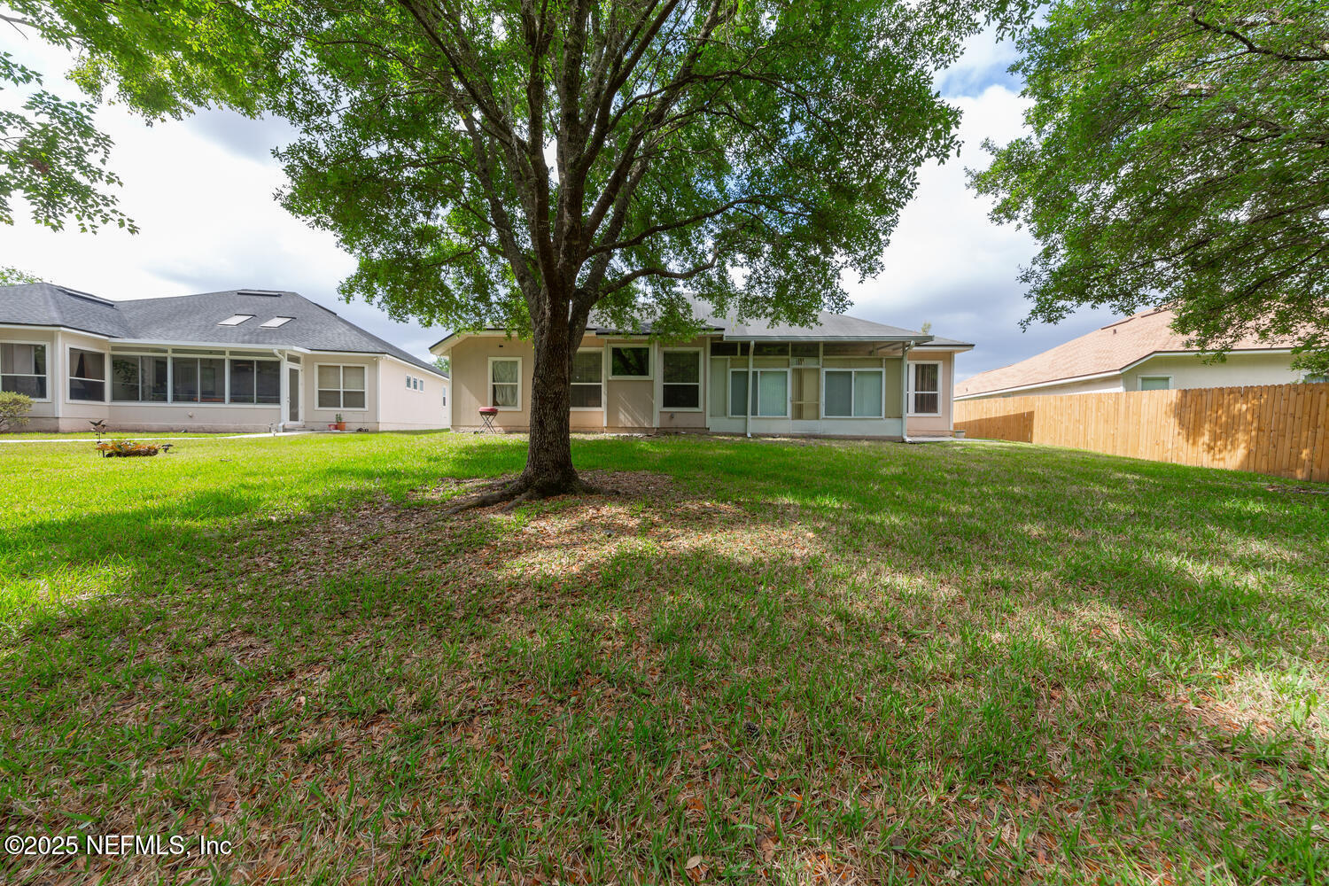 4219 Woodley Creek Road Jacksonville, FL 32218 - Photo 27 of 28 a front view of house with yard and green space