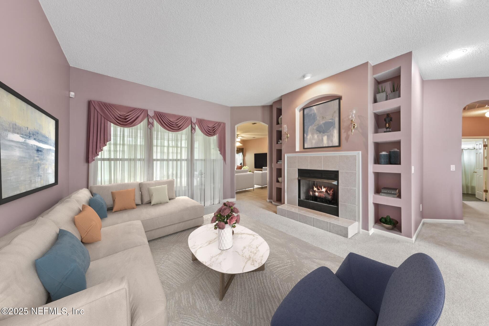 4219 Woodley Creek Road Jacksonville, FL 32218 - Photo 4 of 28 a living room with furniture and a fireplace