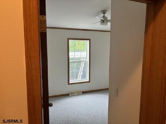 1621 Highway 9 Palermo, NJ 08230 - Photo 11 of 13 an empty room with windows and closet