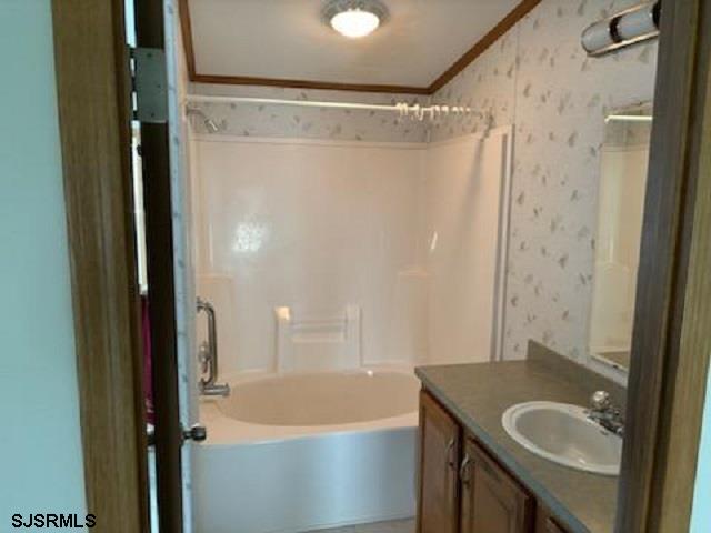 1621 Highway 9 Palermo, NJ 08230 - Photo 7 of 13 a bathroom with a granite countertop sink and a bathtub