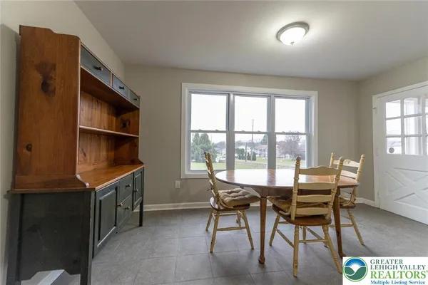 a workspace with furniture and window