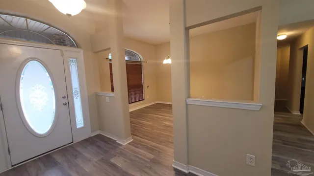 a view of a backyard with sitting area