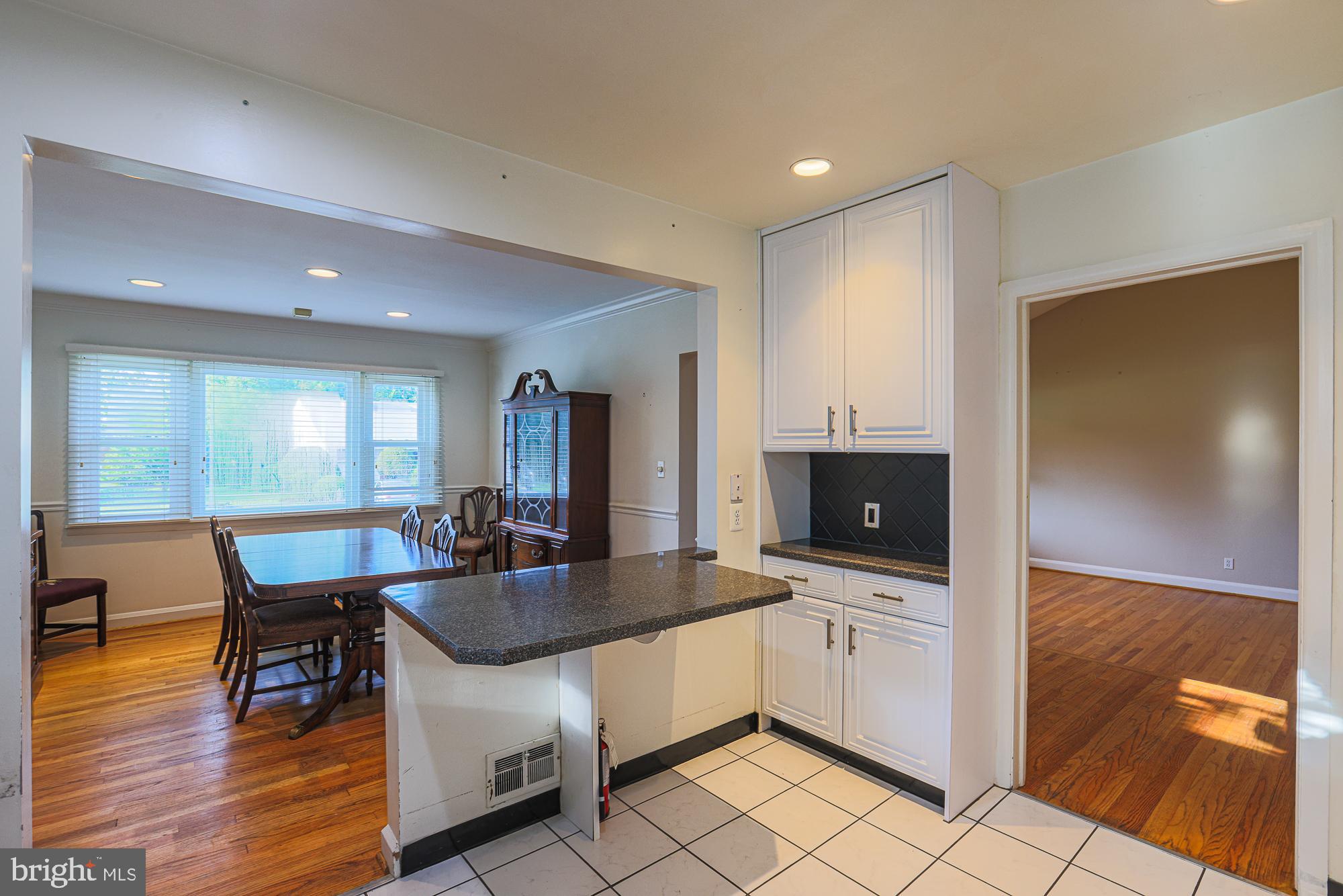 3106 Hatton Road Baltimore, MD 21208 - Photo 24 of 52 a kitchen with granite countertop a sink and counter space