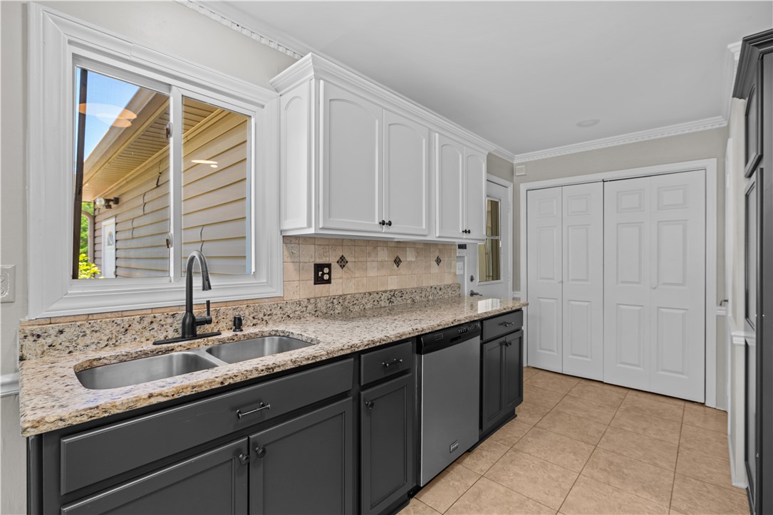 101 Maria Lane Seneca, SC 29678 - Photo 11 of 31 This bright kitchen features ample counter space, modern appliances, and convenient access to the outdoors.