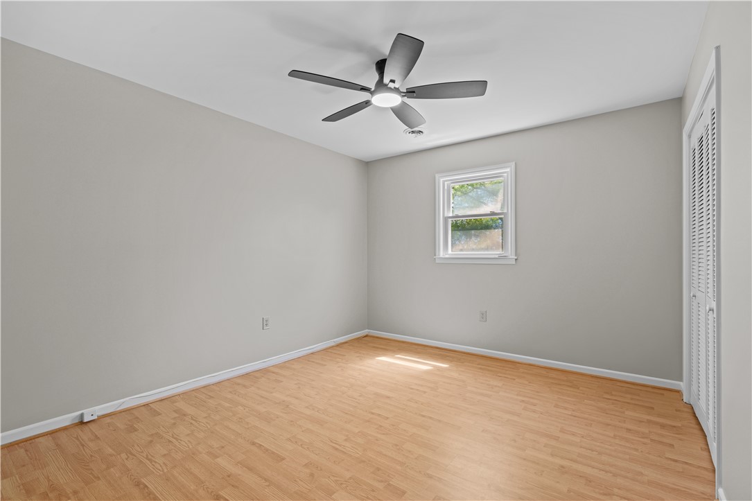 101 Maria Lane Seneca, SC 29678 - Photo 16 of 31 This spacious room features ample natural light and durable flooring, perfect for versatile living.