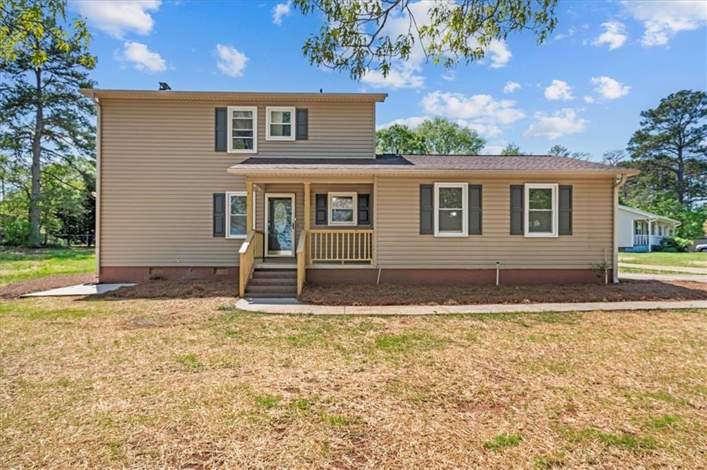 101 Maria Lane Seneca, SC 29678 - Photo 2 of 31 This charming home offers comfortable living with a welcoming facade and mature trees.