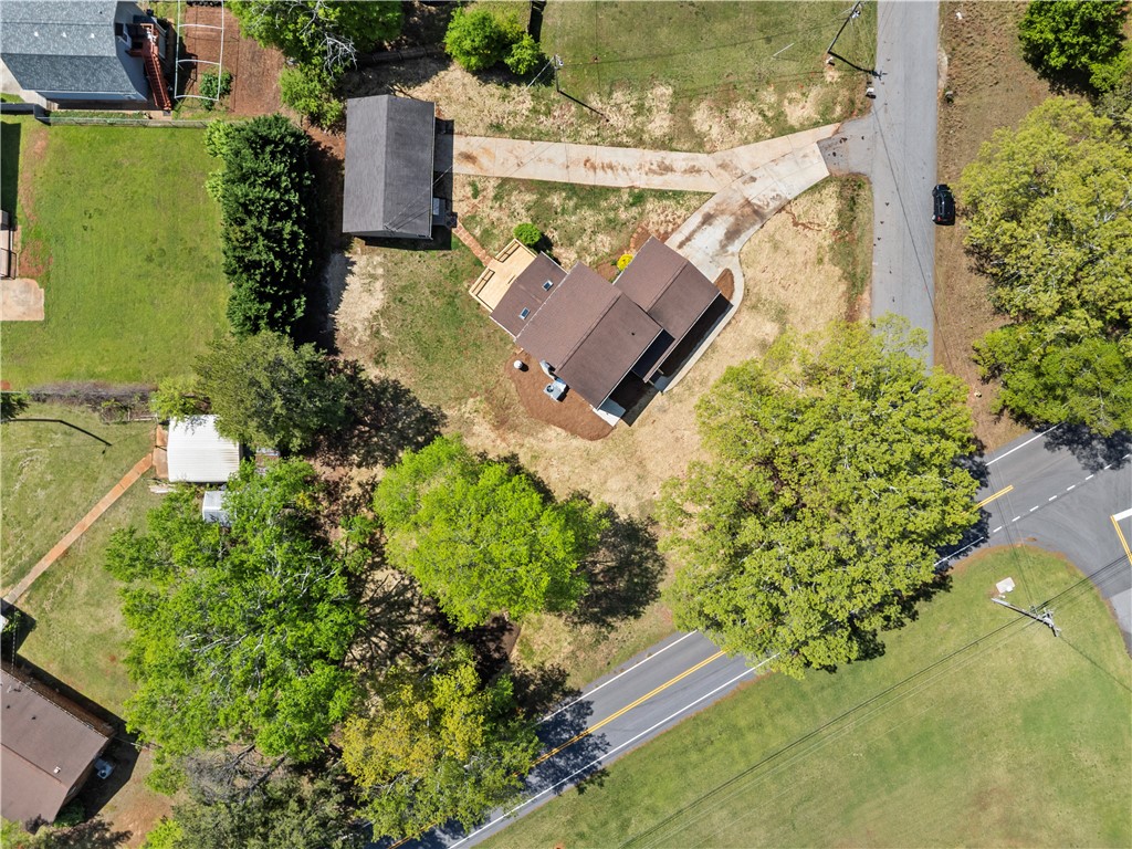 101 Maria Lane Seneca, SC 29678 - Photo 26 of 31 An aerial view showcases a residential property with ample yard space and mature trees.
