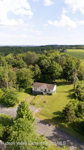 a view of a city with an ocean beach