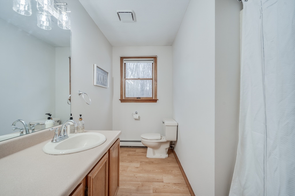 20 Middle Road Enfield, CT 06082 - Photo 19 of 29 a bathroom with a sink and a mirror