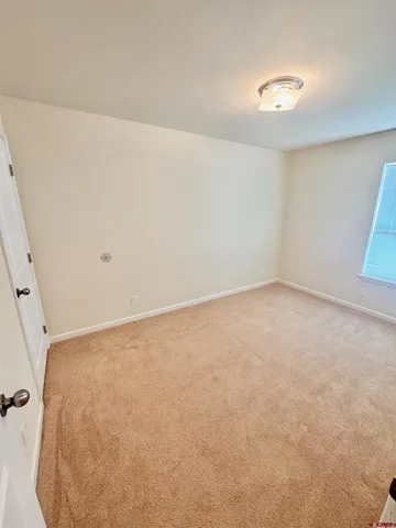 an empty room with a workbench
