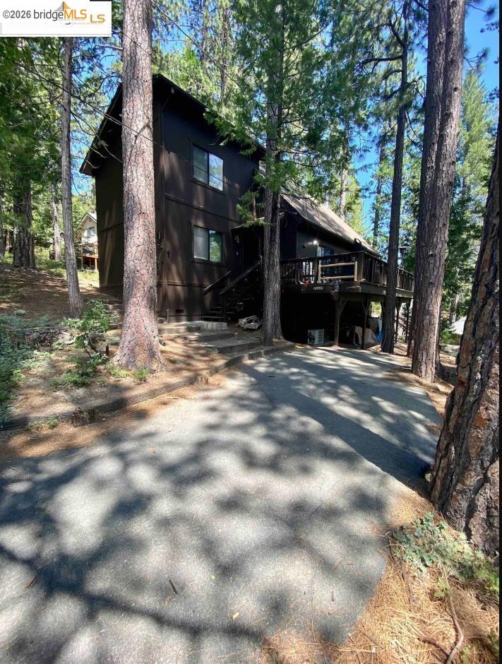 26600 Inyo Drive Cold Springs, CA 95335 - Photo 36 of 38 a view of a house with a tree in the background