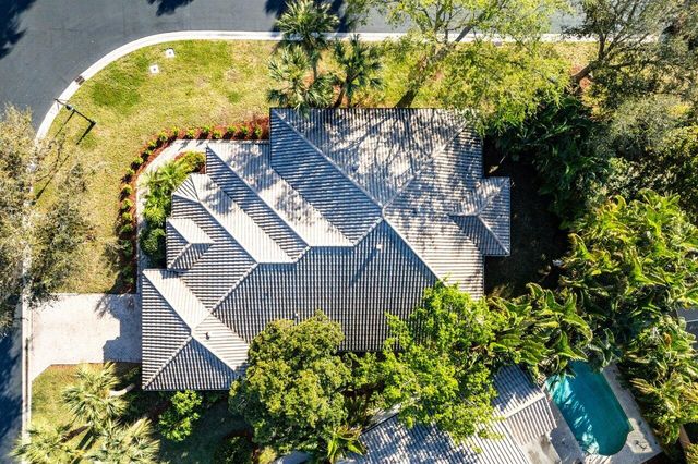 a view of swimming pool with a yard