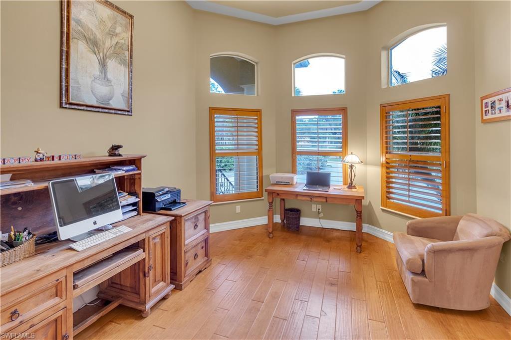 14600 Fritchey Road Naples, FL 34114 - Photo 16 of 44 a living room with furniture and a window