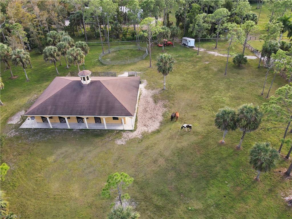 14600 Fritchey Road Naples, FL 34114 - Photo 33 of 44 a aerial view of a house with a yard