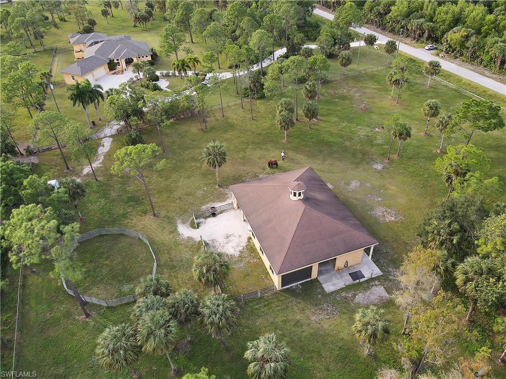 14600 Fritchey Road Naples, FL 34114 - Photo 41 of 44 an aerial view of a house with a yard