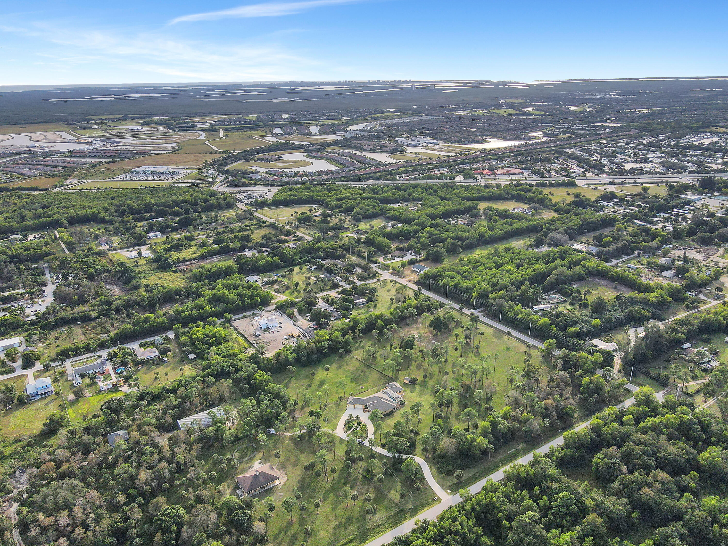 14600 Fritchey Road Naples, FL 34114 - Photo 44 of 44 an aerial view of residential houses with outdoor space