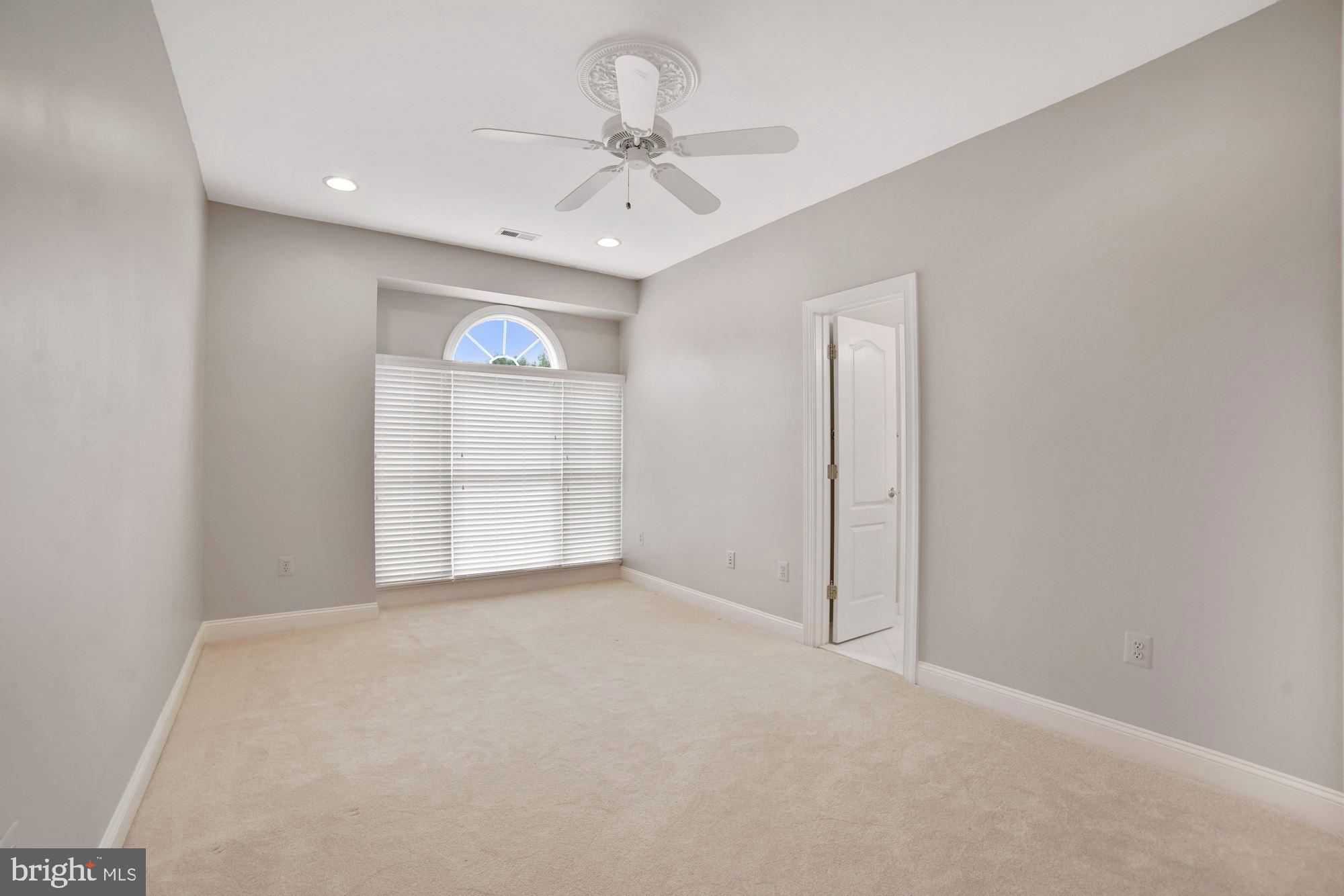 8238 Snead Loop Gainesville, VA 20155 - Photo 28 of 49 a view of an empty room with a window