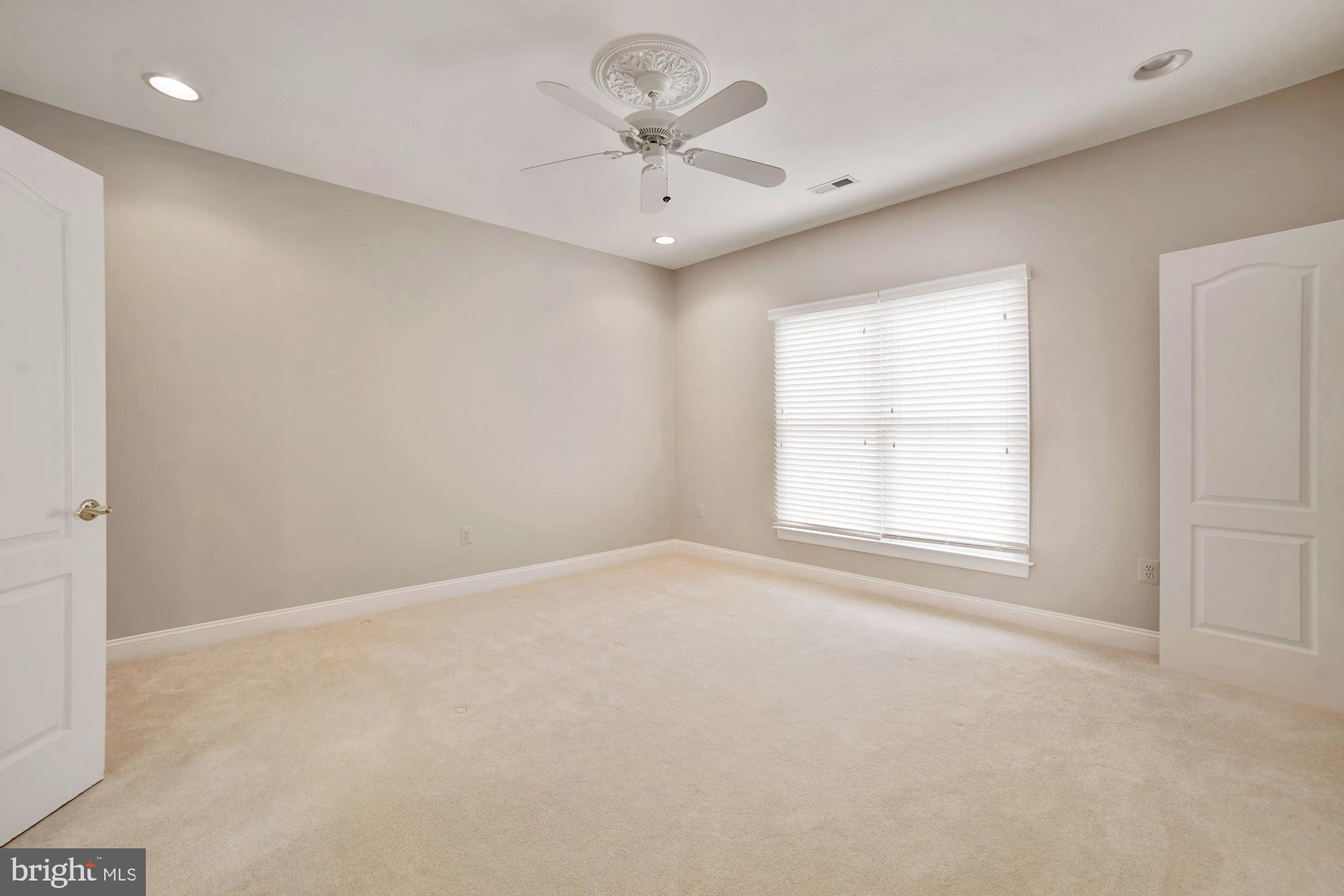 8238 Snead Loop Gainesville, VA 20155 - Photo 30 of 49 a view of an empty room with a window