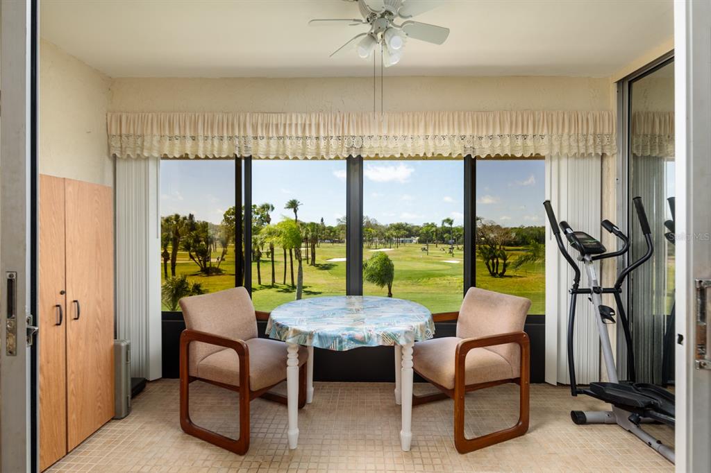 12300 Vonn Road, Unit 6303 Largo, FL 33774 - Photo 13 of 36 a view of a dining room with furniture window and outside view