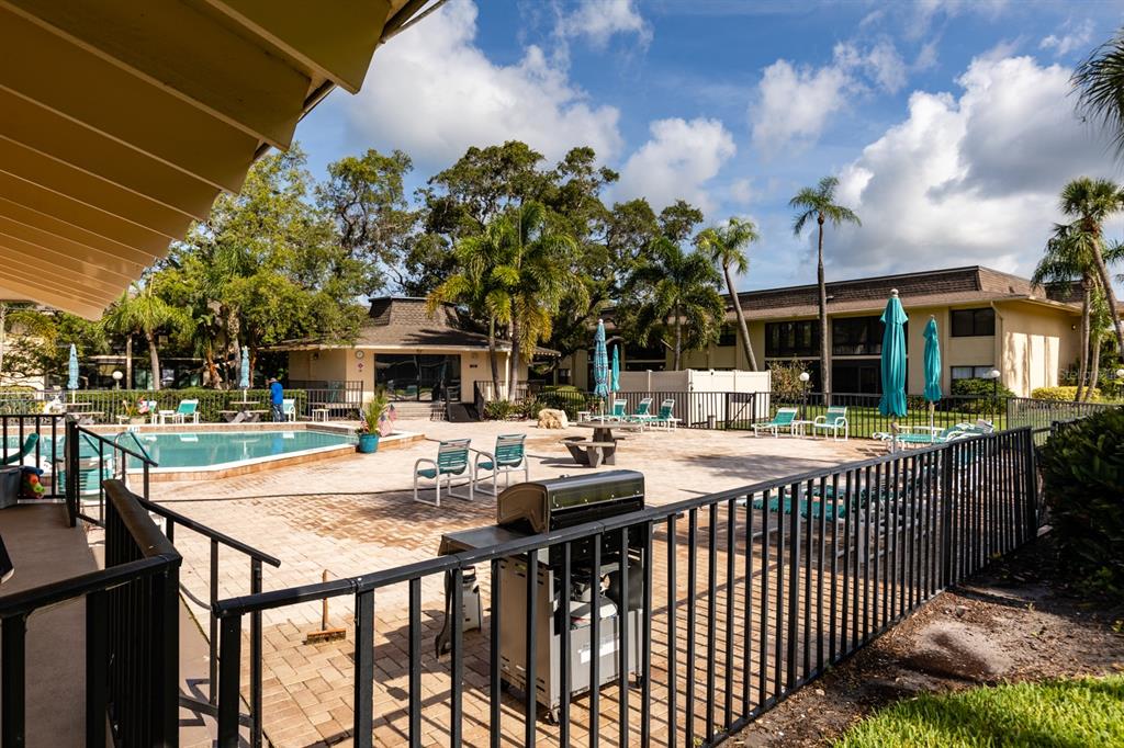 12300 Vonn Road, Unit 6303 Largo, FL 33774 - Photo 27 of 36 a outdoor space with lots of table and chairs