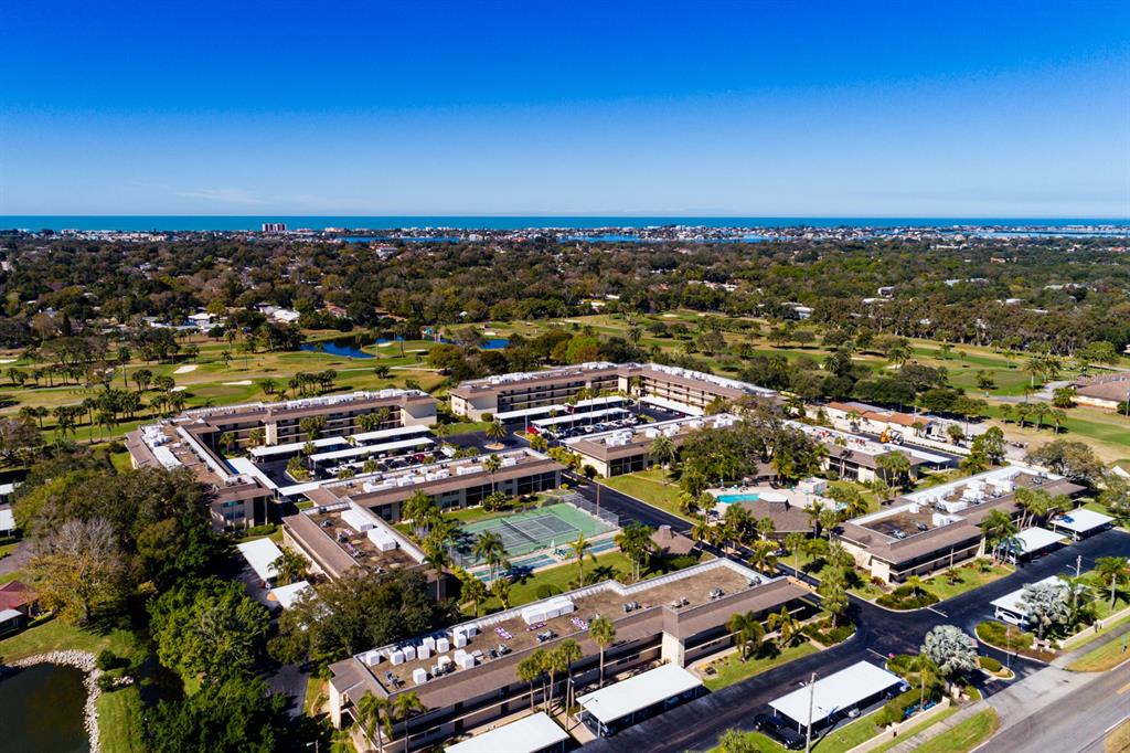 12300 Vonn Road, Unit 6303 Largo, FL 33774 - Photo 35 of 36 an aerial view of a city with lots of residential buildings and ocean view