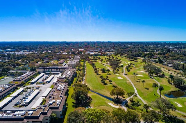 an aerial view of residential building and city view