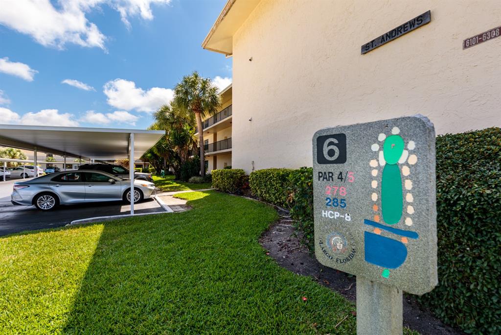 12300 Vonn Road, Unit 6303 Largo, FL 33774 - Photo 5 of 36 a front view of a house with garden