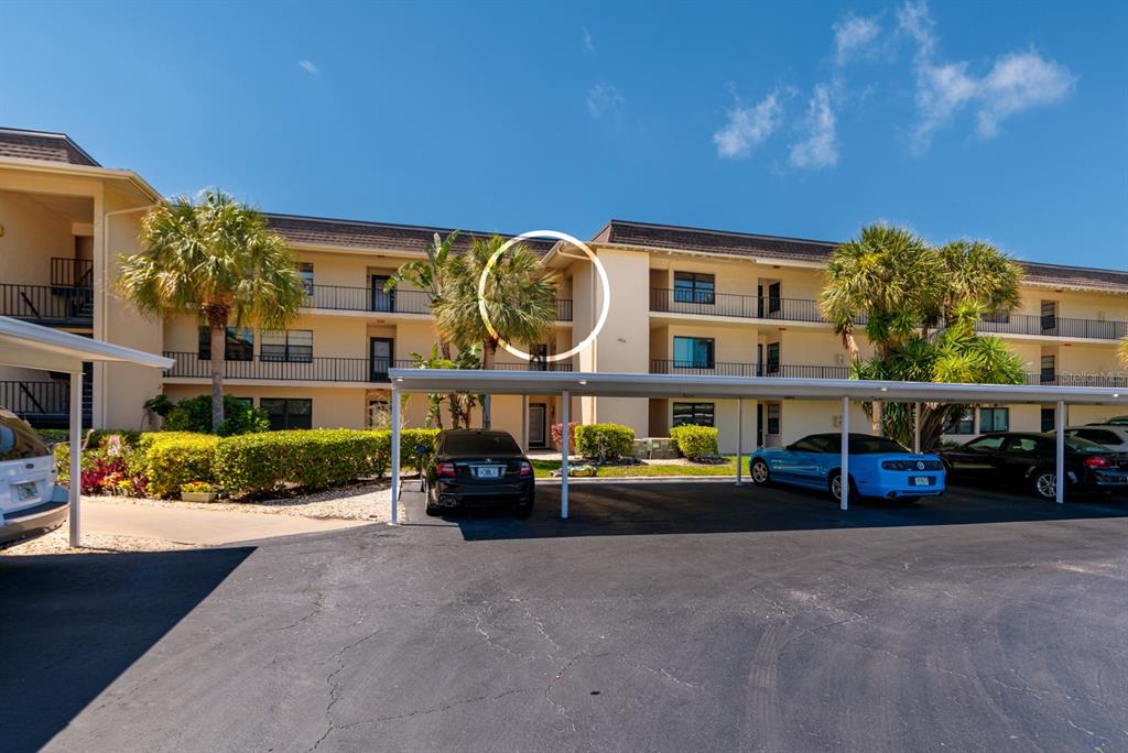 12300 Vonn Road, Unit 6303 Largo, FL 33774 - Photo 6 of 36 front view of house with a garden