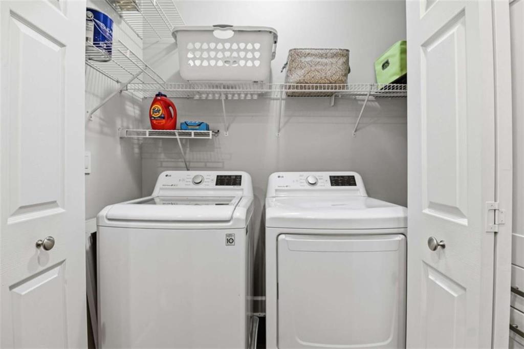 3047 Lenox Road Northeast, Unit 1108 Atlanta, GA 30324 - Photo 23 of 32 a utility room with dryer and washer