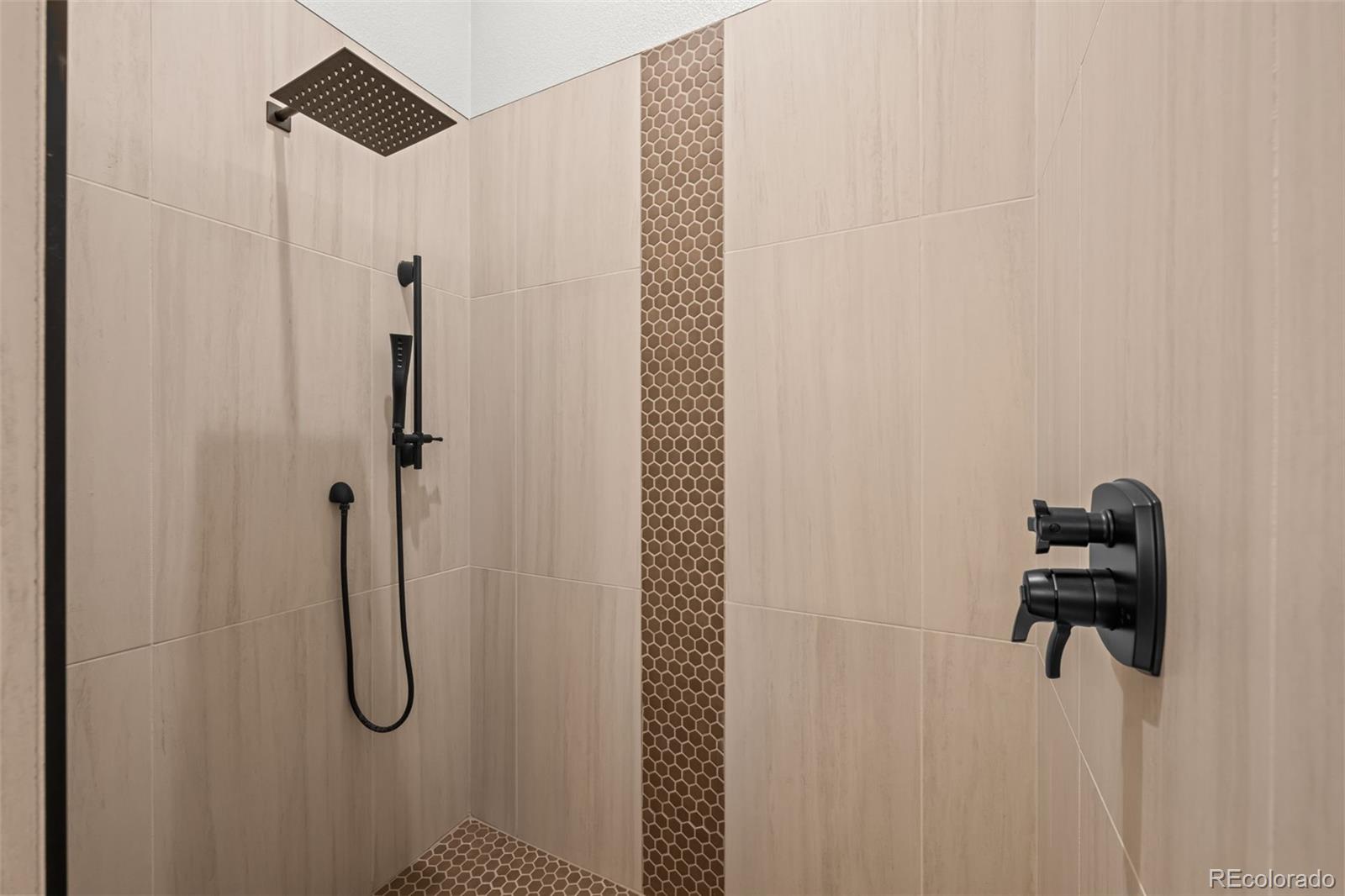 44 Forest Ridge Circle Bailey, CO 80421 - Photo 18 of 50 a bathroom with a shower