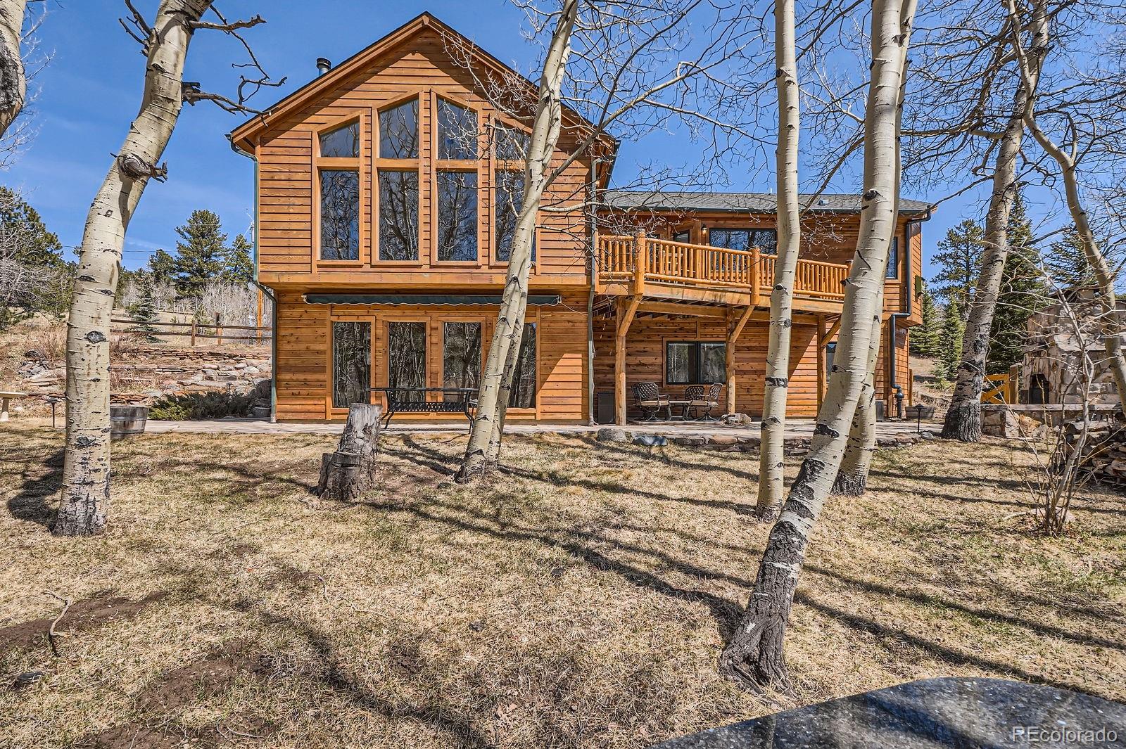 44 Forest Ridge Circle Bailey, CO 80421 - Photo 33 of 50 front view of a house with a yard