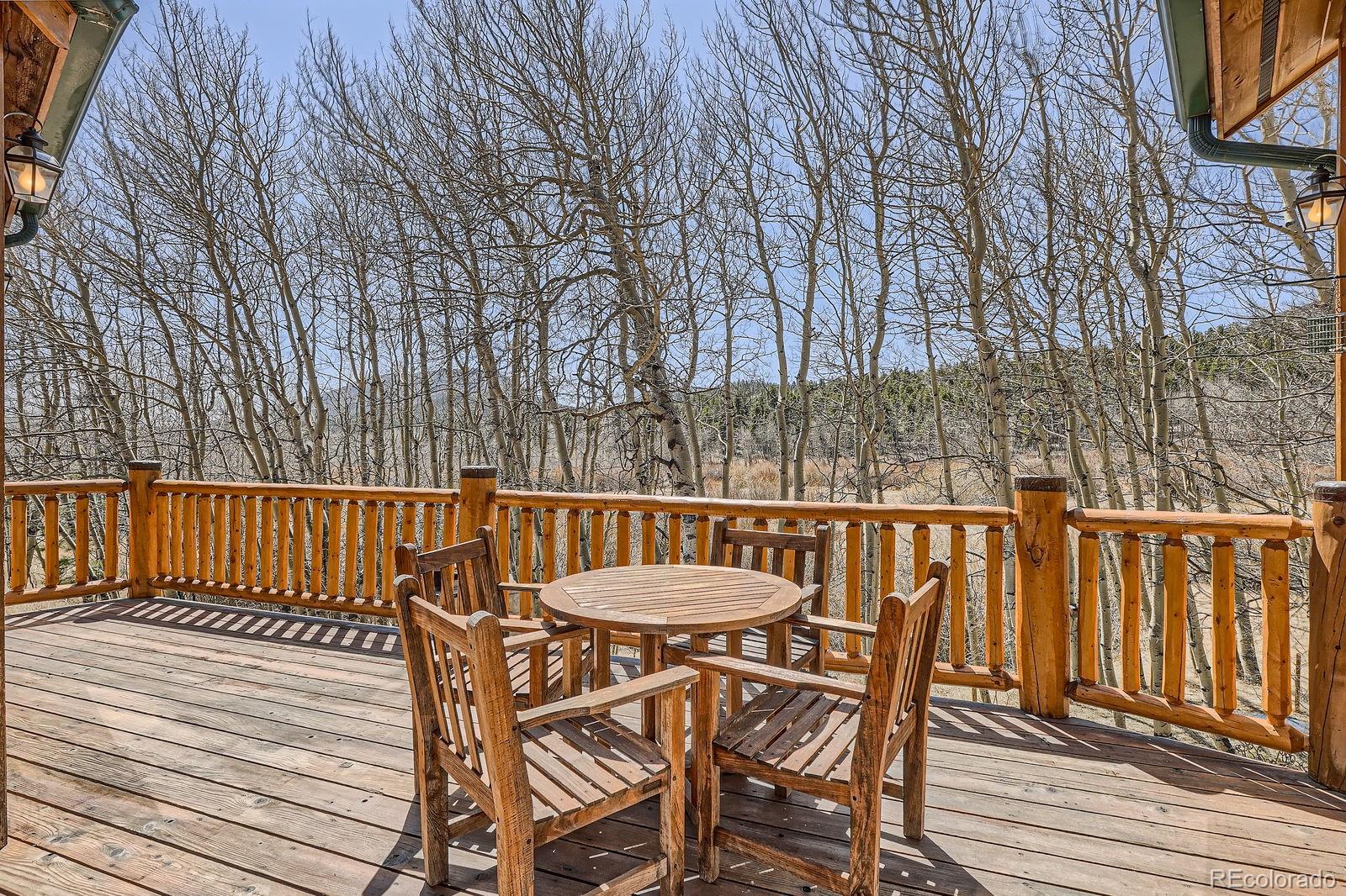 44 Forest Ridge Circle Bailey, CO 80421 - Photo 37 of 50 a view of a chairs on the roof deck