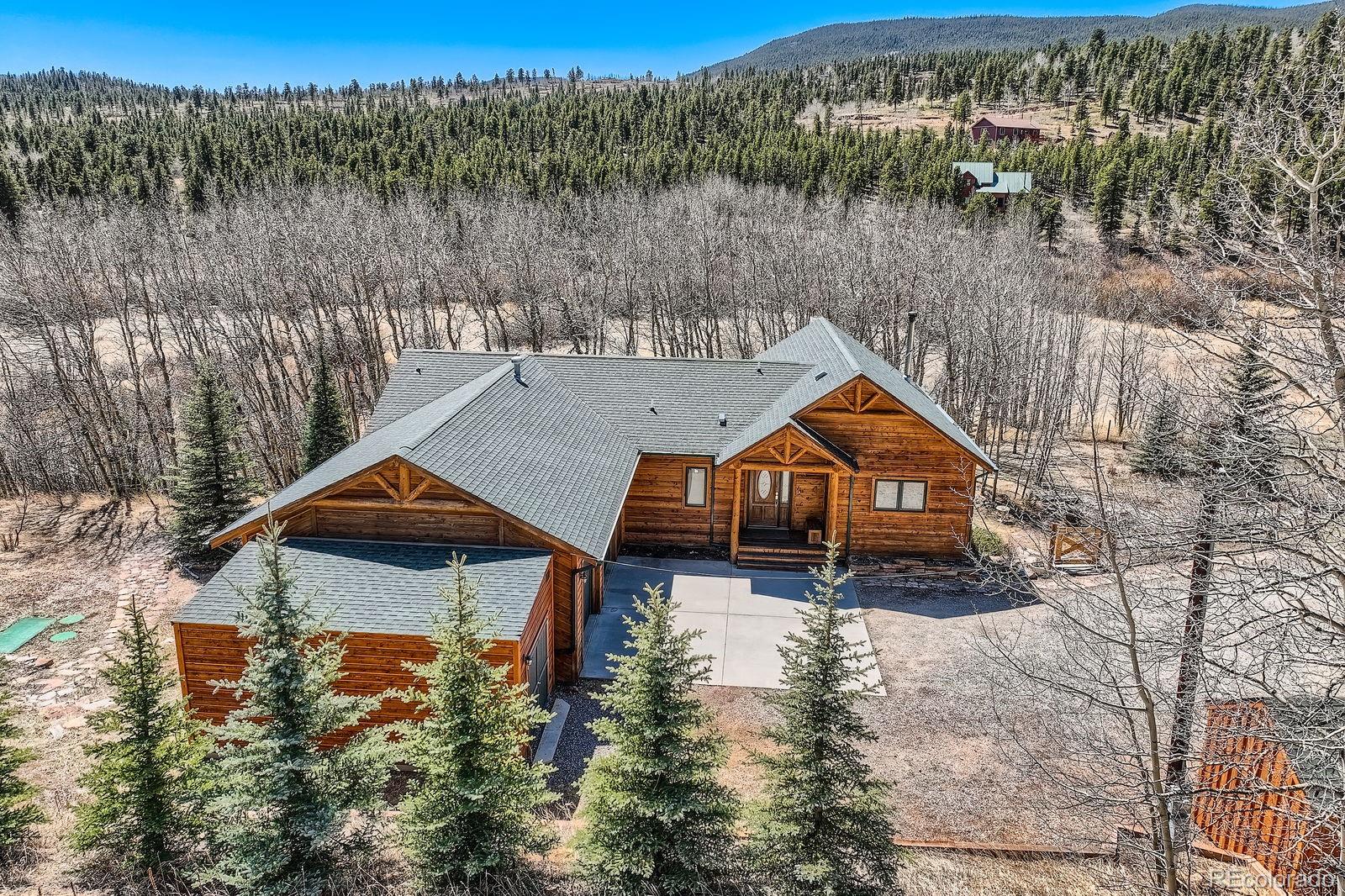 44 Forest Ridge Circle Bailey, CO 80421 - Photo 4 of 50 an aerial view of a house with a yard