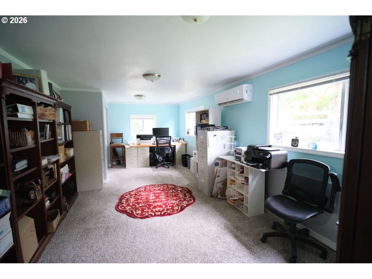 70214 Lakewood Road North Bend, OR 97459 - Photo 22 of 39 a view of a workspace with furniture and a window