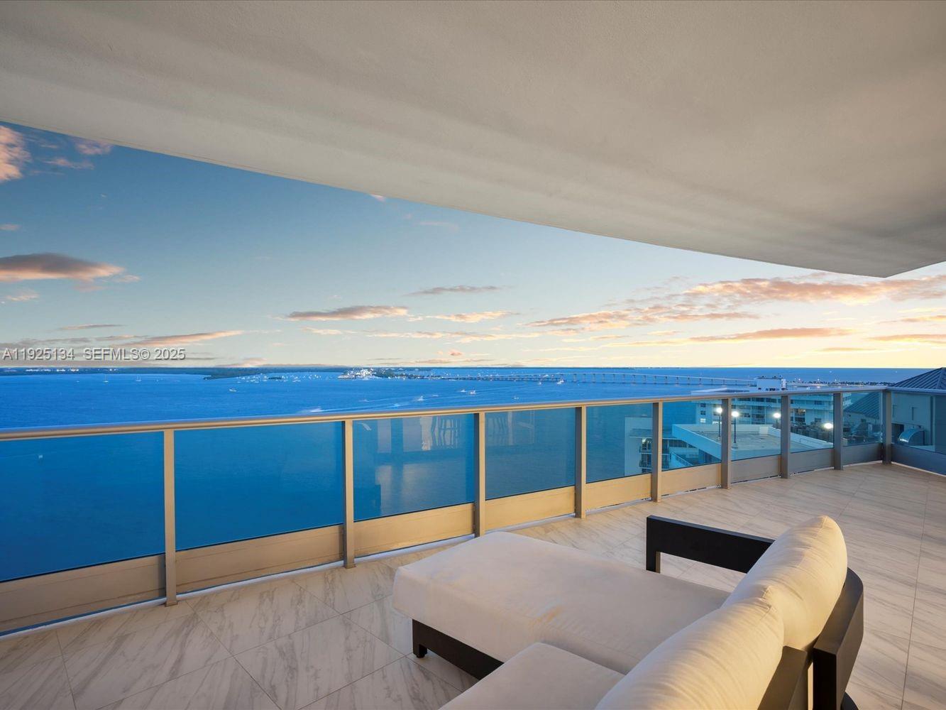 1331 Brickell Bay Drive, Unit 1811 Miami, FL 33131 - Photo 16 of 30 a view of a living room and bedroom