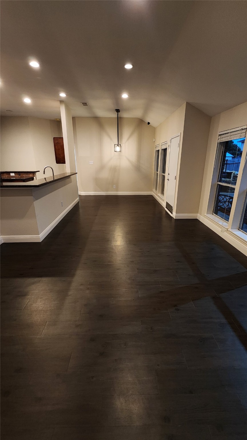 9310 Blackhawk Circle Houston, TX 77075 - Photo 12 of 23 a view of empty room with wooden floor and windows
