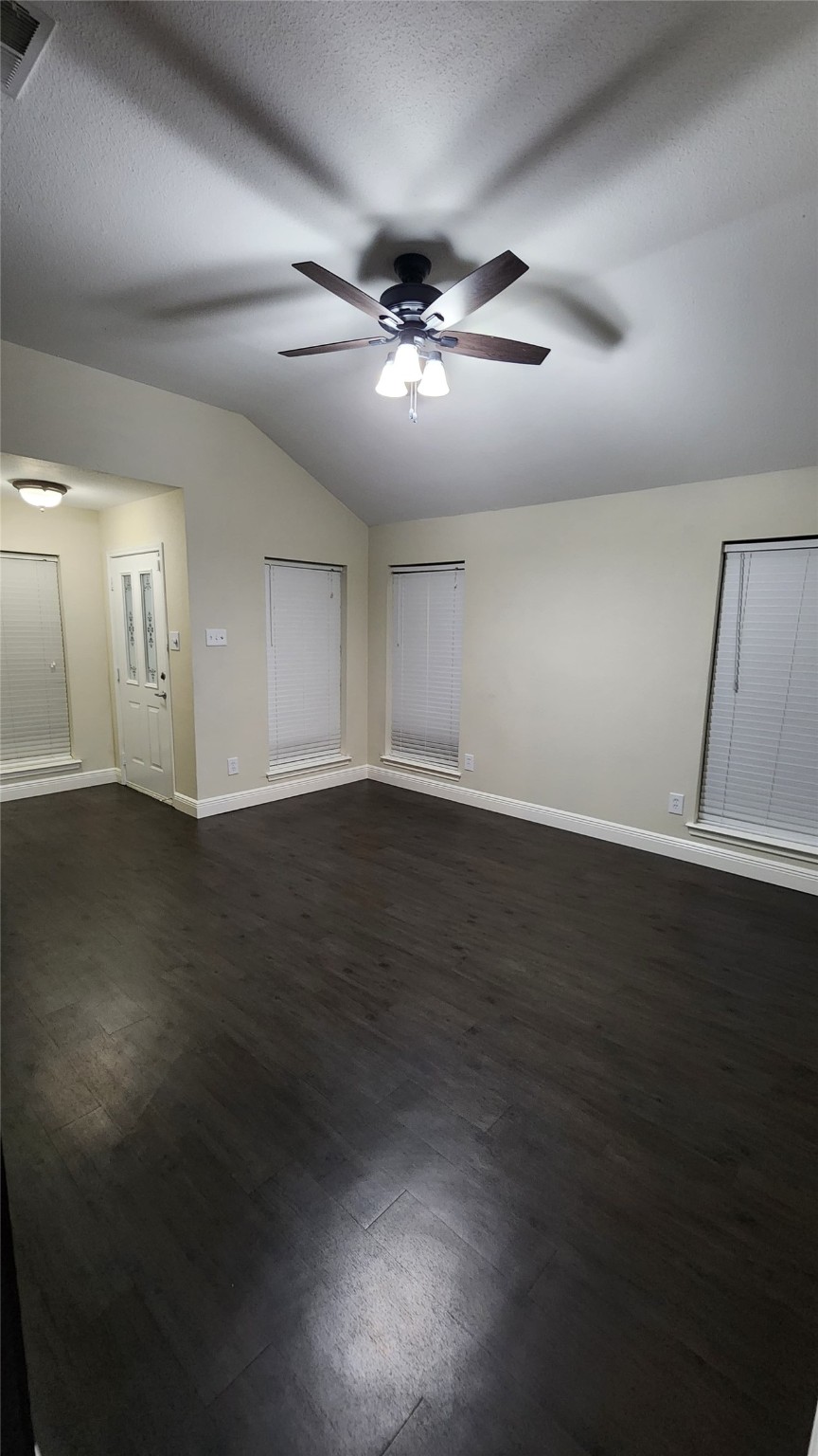9310 Blackhawk Circle Houston, TX 77075 - Photo 13 of 23 a view of an empty room with wooden floor