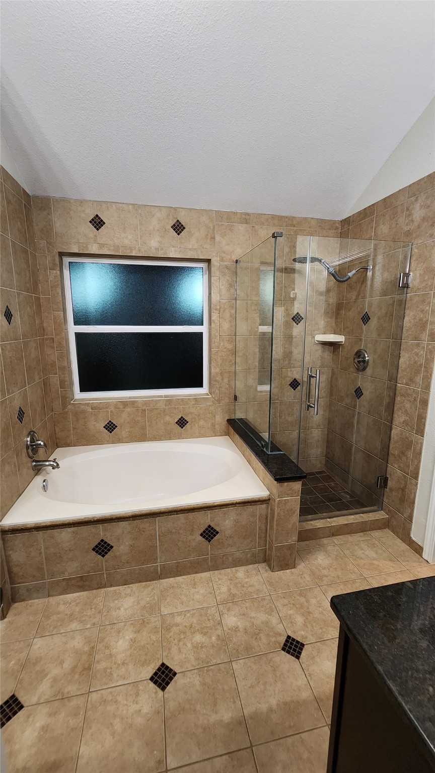 9310 Blackhawk Circle Houston, TX 77075 - Photo 15 of 23 a bathroom with a double vanity sink a mirror and shower