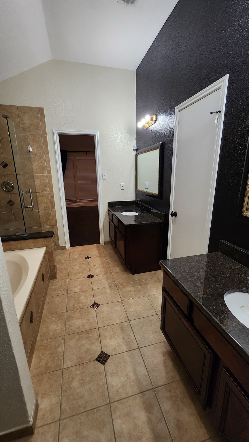 9310 Blackhawk Circle Houston, TX 77075 - Photo 16 of 23 a kitchen with a sink a stove and a refrigerator