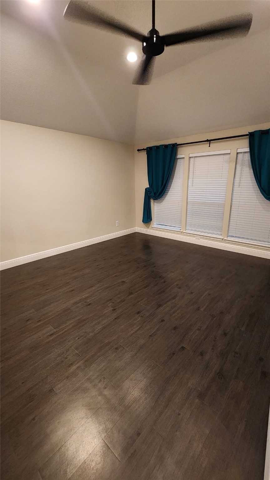 9310 Blackhawk Circle Houston, TX 77075 - Photo 18 of 23 an empty room with wooden floor and windows