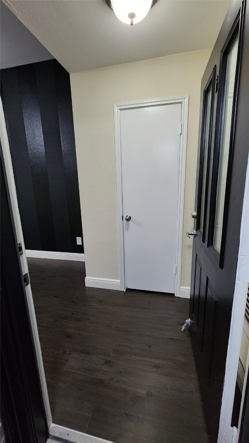 9310 Blackhawk Circle Houston, TX 77075 - Photo 2 of 23 a view of an empty room with wooden floor