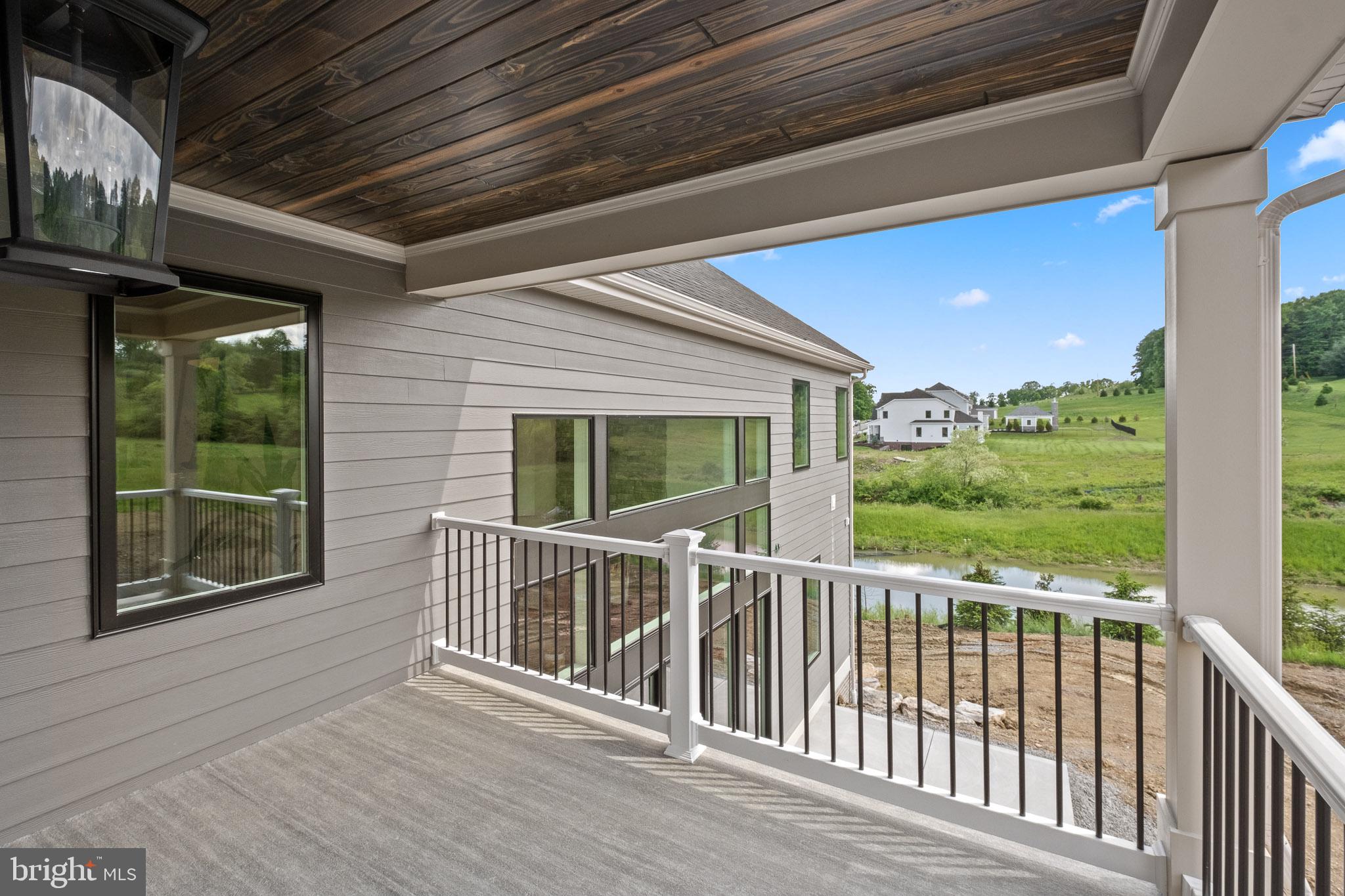 355 Bronson Circle, Unit R1D Collegeville, PA 19426 - Photo 30 of 47 a view of deck with flat screen tv and floor