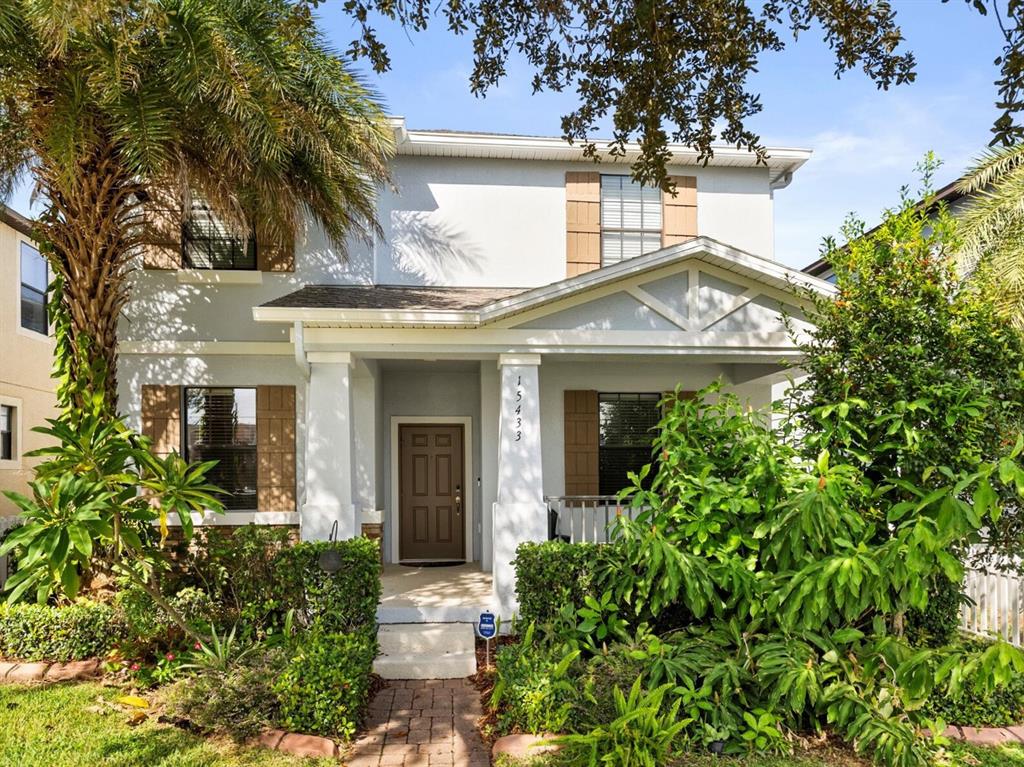 front view of a house with a small yard