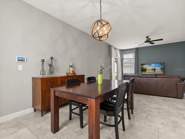a view of a dining room and a table