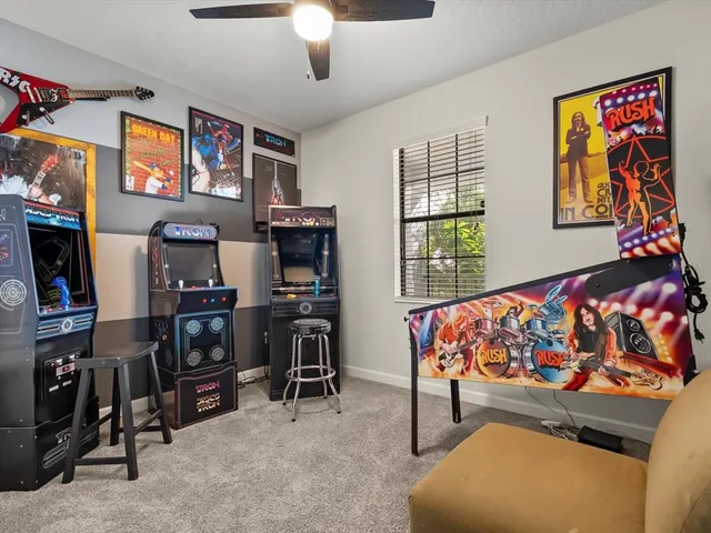 a bedroom with furniture and window