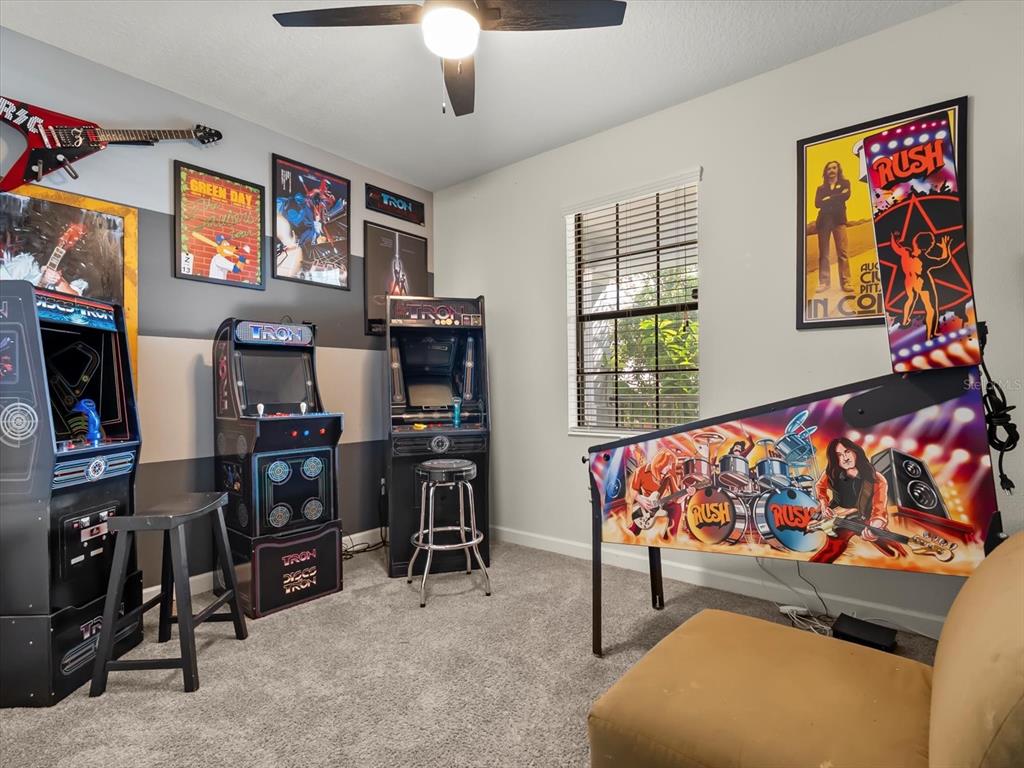 15433 Porter Road Winter Garden, FL 34787 - Photo 16 of 46 a bedroom with furniture and window