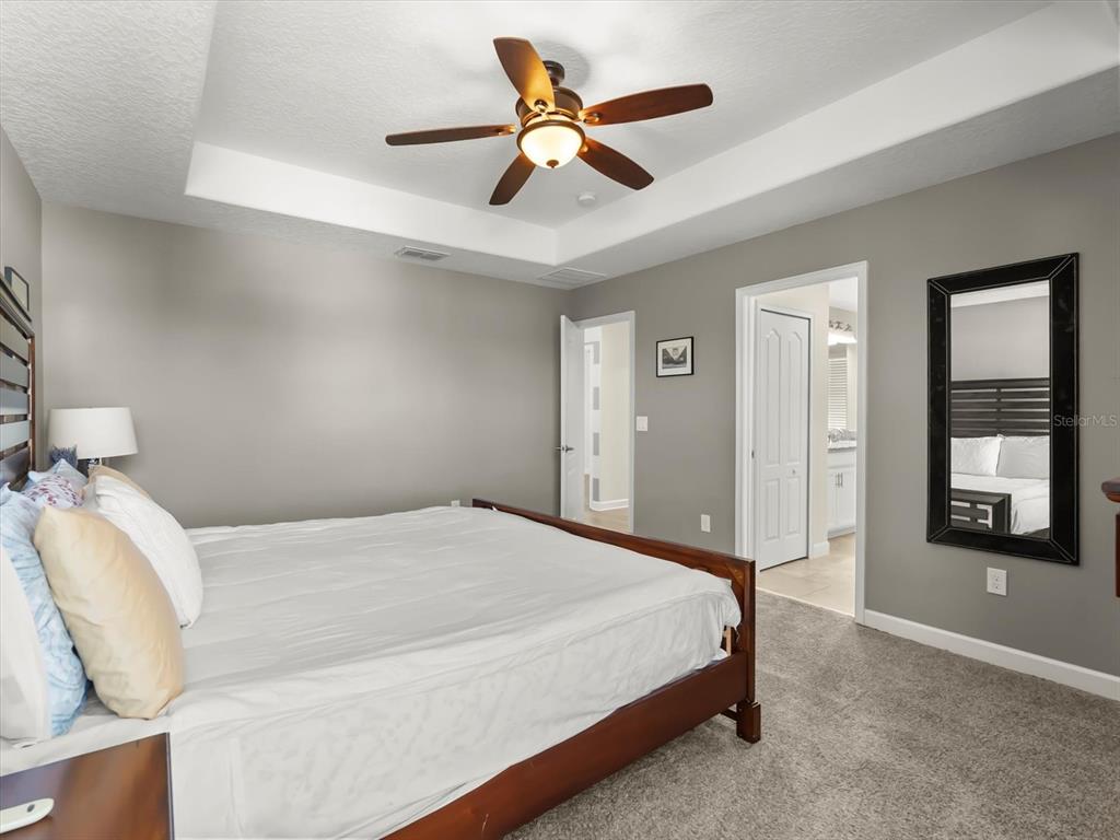 15433 Porter Road Winter Garden, FL 34787 - Photo 24 of 46 a bedroom with a bed and window