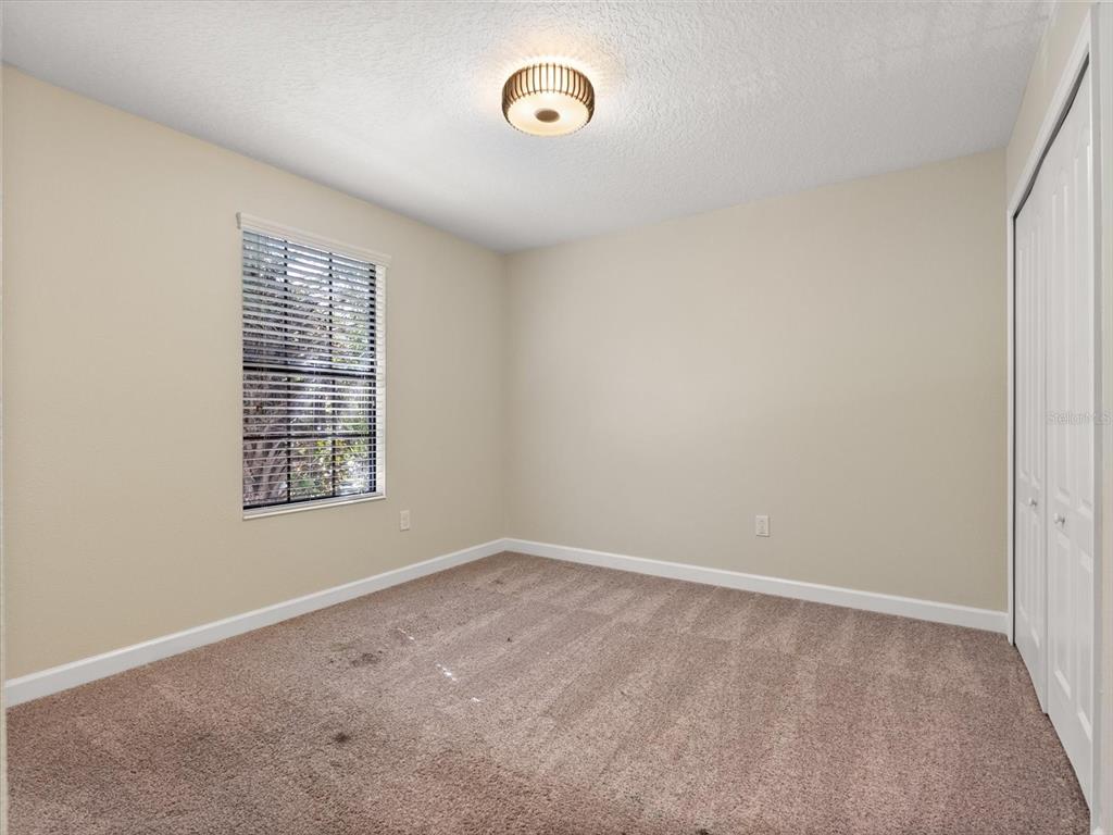 15433 Porter Road Winter Garden, FL 34787 - Photo 34 of 46 an empty room with a window
