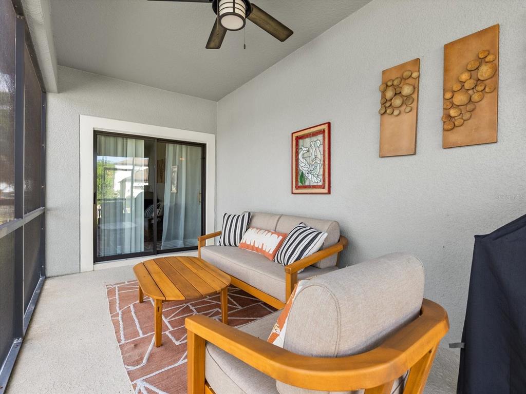15433 Porter Road Winter Garden, FL 34787 - Photo 39 of 46 a view of a livingroom with furniture and a couch