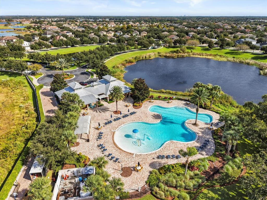 15433 Porter Road Winter Garden, FL 34787 - Photo 43 of 46 an aerial view of a house with outdoor space swimming pool and ocean view